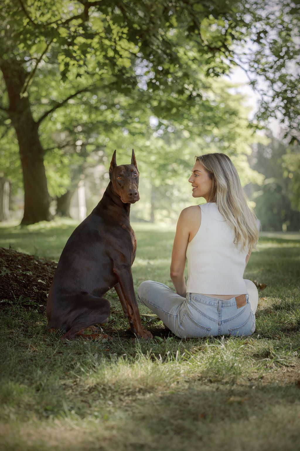 Family connection portrait with a dog outdoors